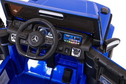 Mercedes AMG G63 dla dzieci Lakier Niebieski + Pilot + MP3 LED + Wolny Start + EVA + Pasy Mercedes AMG G63 dla dzieci Lakier Niebieski + Pilot + MP3 LED + Wolny Start + EVA + Pasy