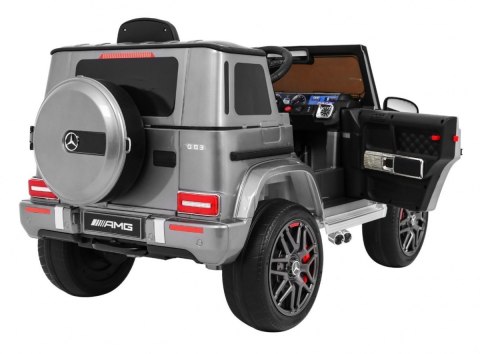 Mercedes AMG G63 dla dzieci Lakier Srebrny + Pilot + MP3 LED + Wolny Start + EVA + Pasy Mercedes AMG G63 dla dzieci Lakier Srebrny + Pilot + MP3 LED + Wolny Start + EVA + Pasy