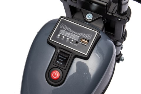 Motorek Chopper FASTER na akumulator dla dzieci Szary + Radio FM + Panel audio + LED Motorek Chopper FASTER na akumulator dla dzieci Szary + Radio FM + Panel audio + LED