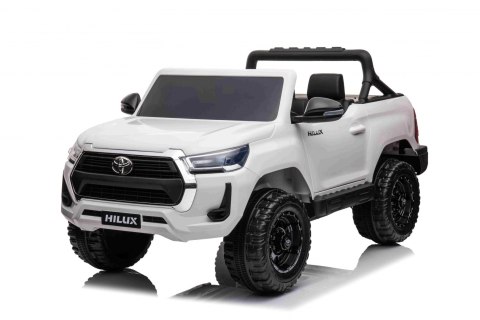Toyota Hilux na akumulator dla dzieci Biały + Napęd 4x4 + Pilot + 2 bagażniki + Radio MP3 + LED Toyota Hilux na akumulator dla dzieci Biały + Napęd 4x4 + Pilot + 2 bagażniki + Radio MP3 + LED